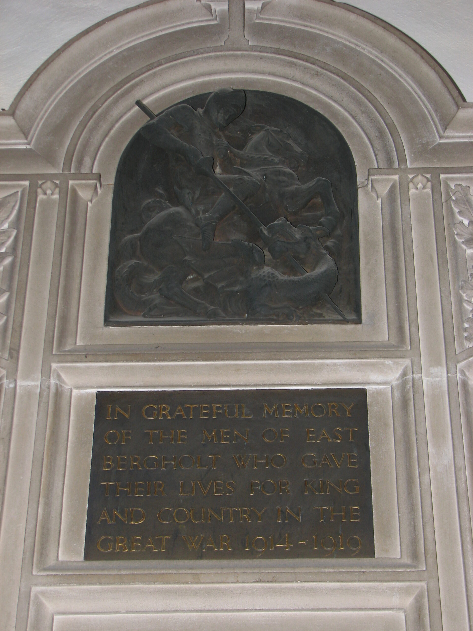 Bronze Bas Relief of St. George slaying the Dragon and the Dedication on the Village Memorial to the Fallen of The Great War<br>St. Mary's Church<br />MA