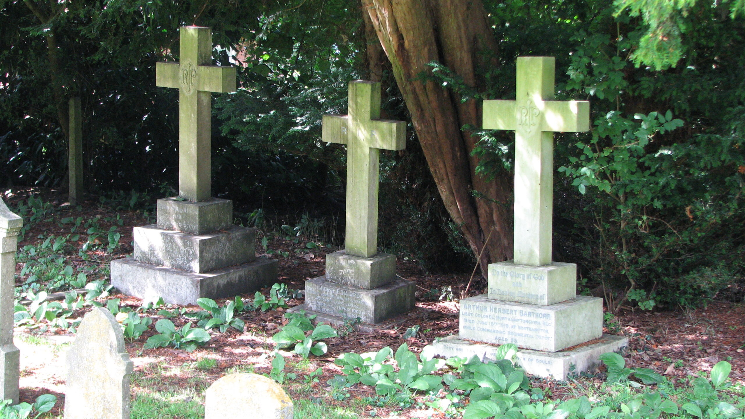 From l. to r. the headstones of Florence Barthorp, Nigel Barthorp and Arthur Barthorp, East Bergholt Cemetery<br>MA