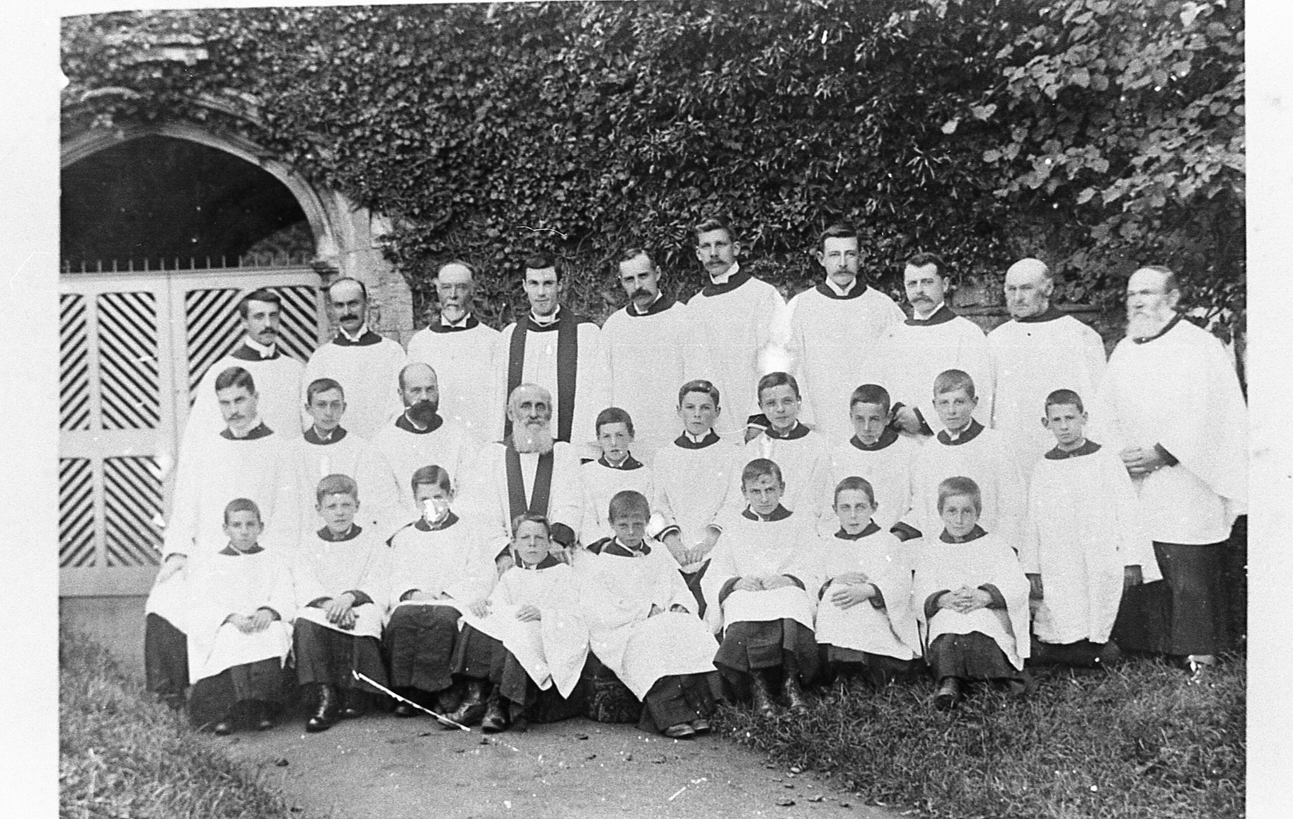 Ronald's father - the Rev. J.J. Lias (seated, with the long, white beard) - and the Clergy and Choir of St. Mary's Church, East Bergholt.<br>Photograph taken between 1892 and 1903<br />Copyright © East Bergholt Society, 1924